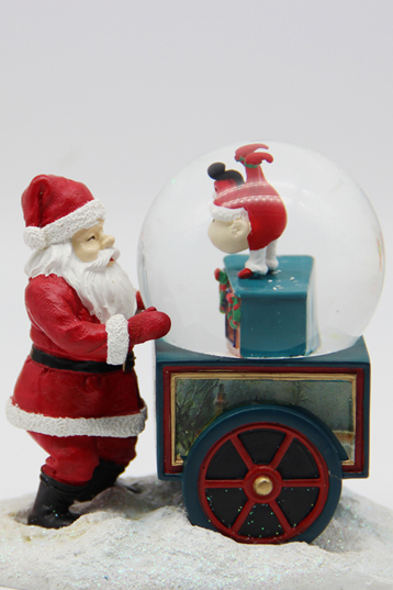 Christmas carousel and snow globe